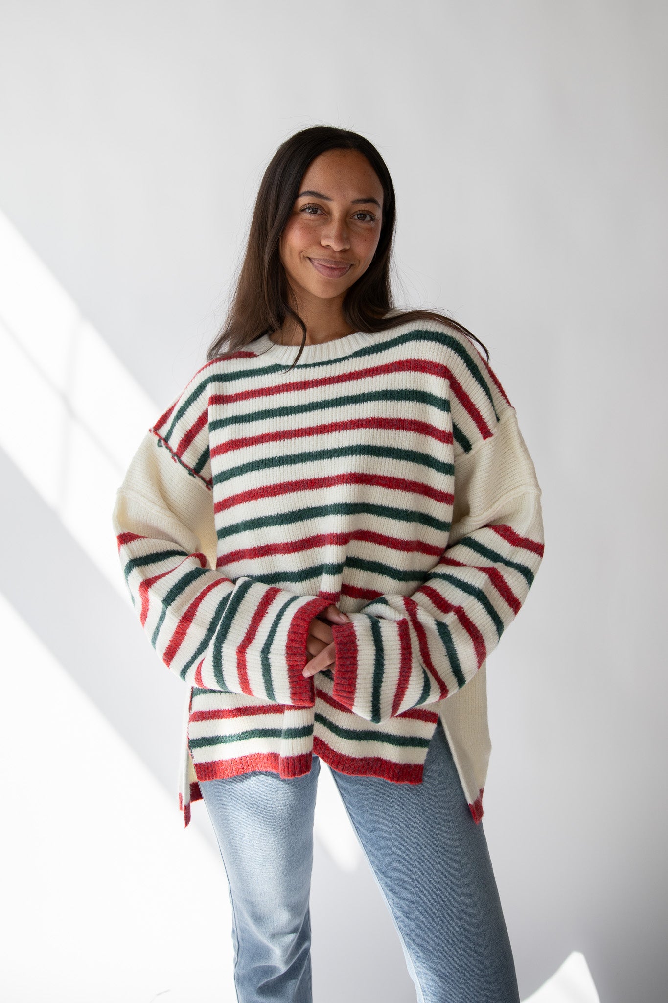 HOLIDAY CHEER STRIPED SWEATER