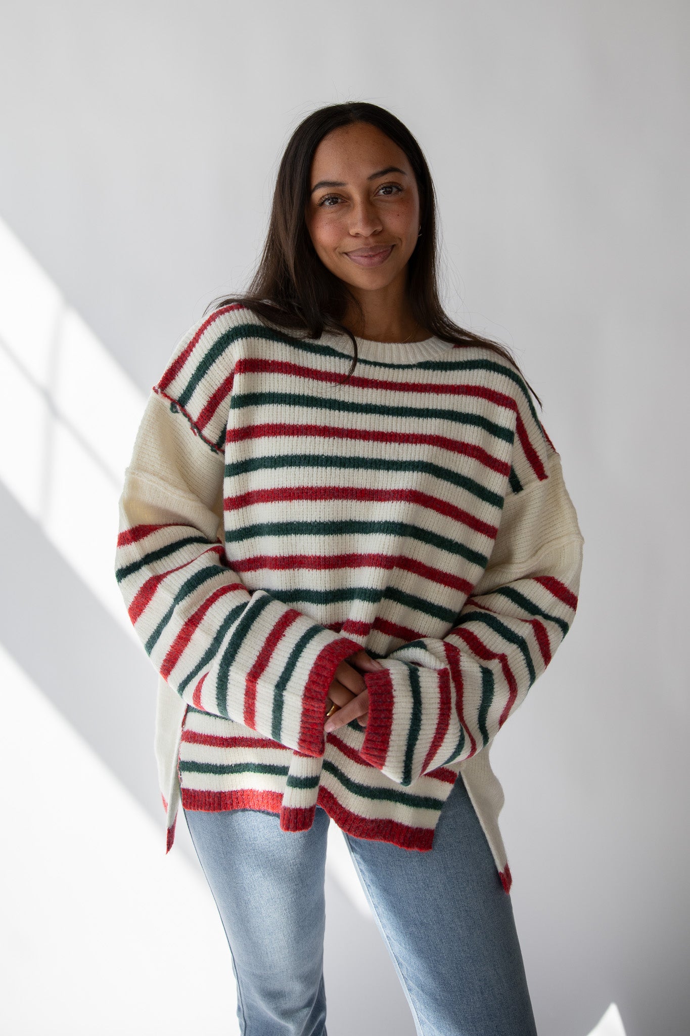 HOLIDAY CHEER STRIPED SWEATER