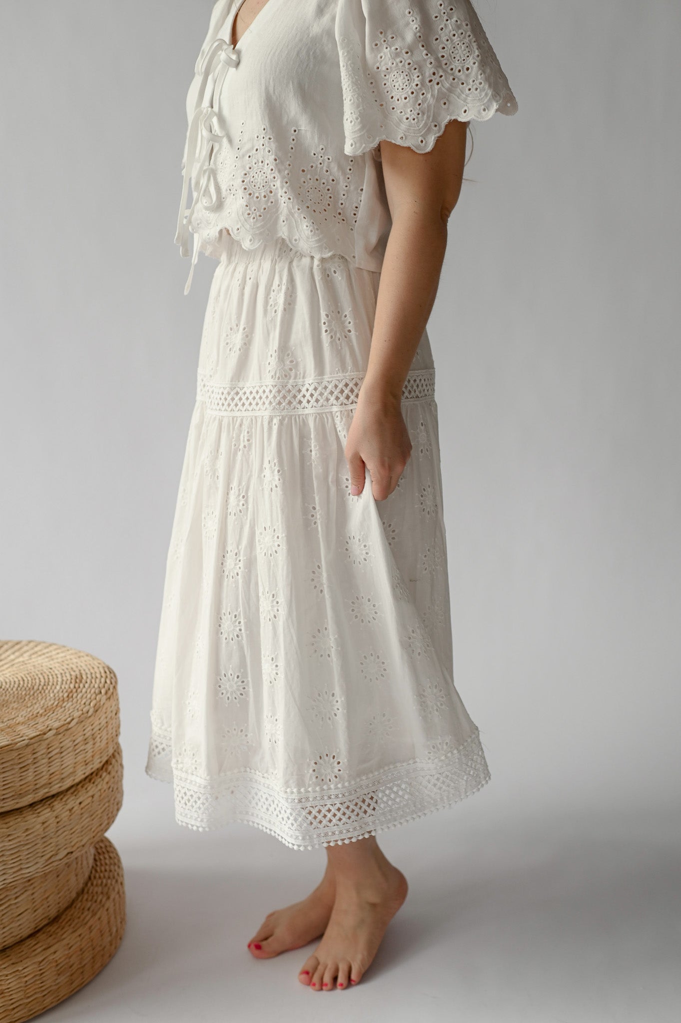 EYELET EMBROIDERED MIDI SKIRT