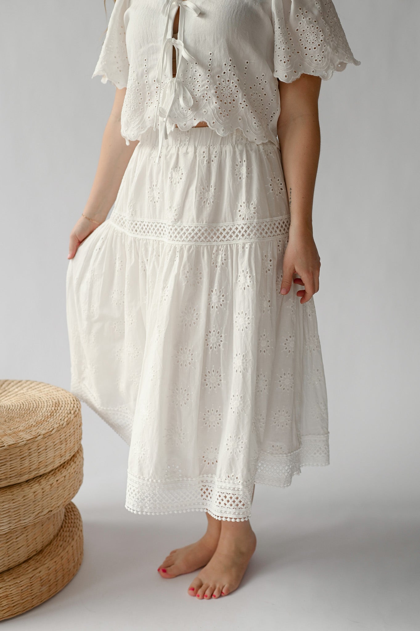 EYELET EMBROIDERED MIDI SKIRT